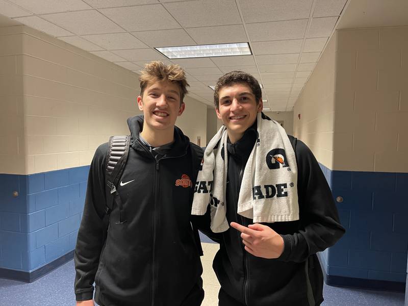 Wheaton Warrenville South's Max O'Connell (left) and Luca Carbonaro following their 45-35 win over Geneva on Friday, Dec. 1. Photo by Jacob Bartelson.