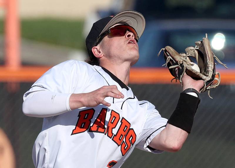 DeKalb's Nikolas Nelson catches a popup in the infield during their game against Naperville Central Tuesday, April 30, 2024, at DeKalb High School.