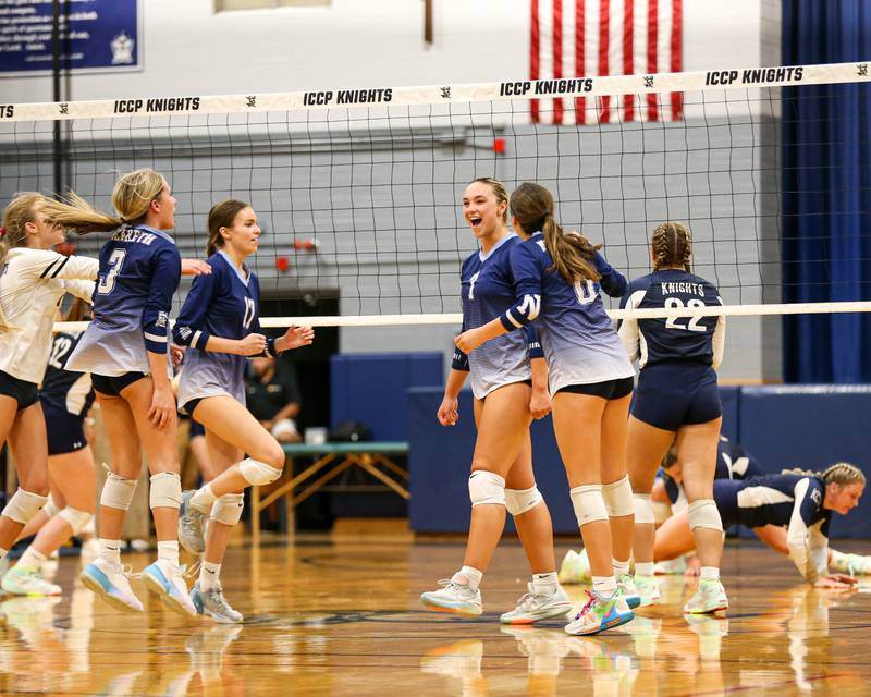 Nazareth celebrates a point during volleyball match between Nazareth at IC Catholic Prep.  Aug 29, 2023.