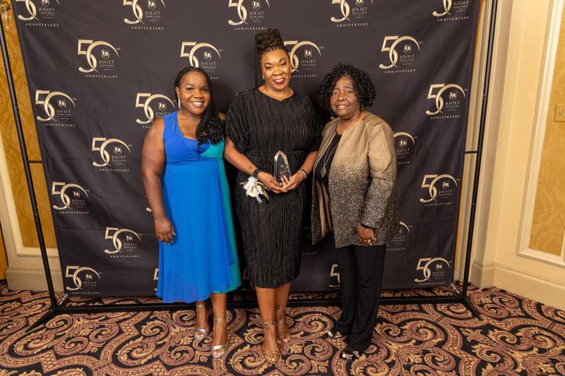 Pictured are the family of 2023 J.D. Ross Extraordinary Service Award winner Michael Austin Clark, who received the award posthumously.