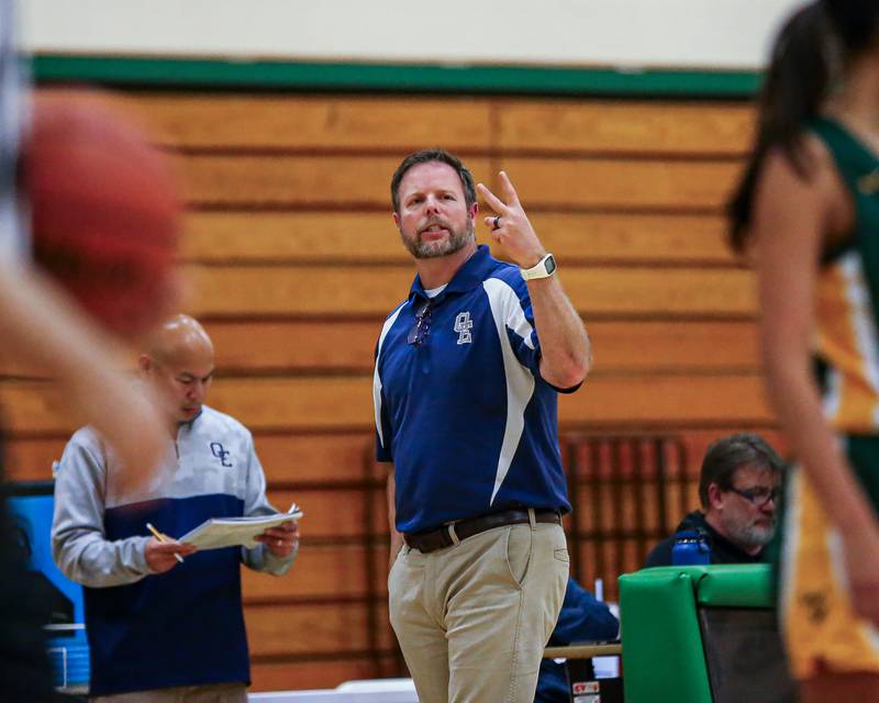 Oswego East's head coach Abe Carretto calls out a set at the York Thanksgiving Tournament. Nov 13, 2023.