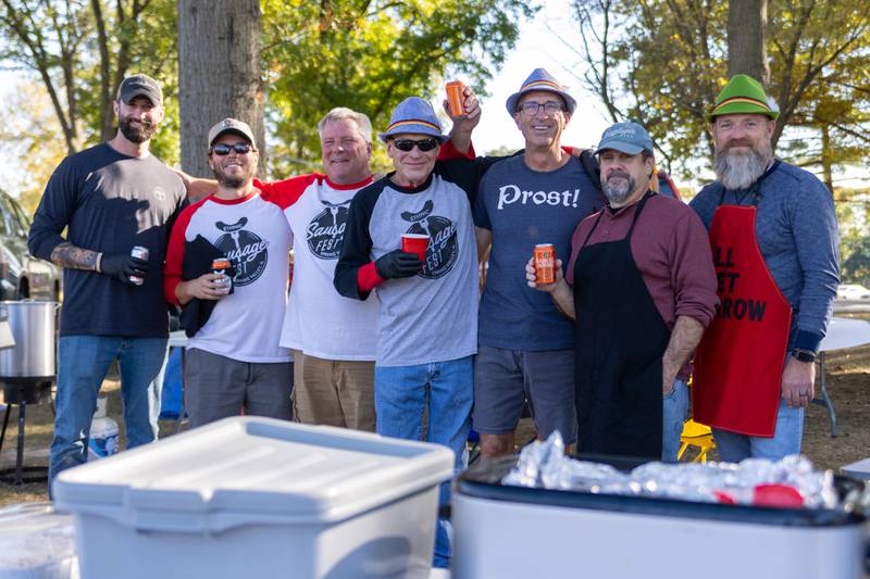 The Ethnic Sausage Boys of Spring Valley pose for picture at the annual Harvest Fest on Saturday, Oct. 19, 2024, at Kirby Park in Spring Valley.