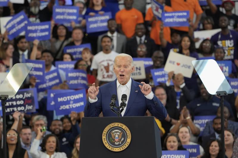 President Joe Biden gestures while speaking to supporters at a campaign event at Renaissance High School in Detroit, Friday, July 12, 2024, in Detroit. (AP Photo/Carlos Osorio)