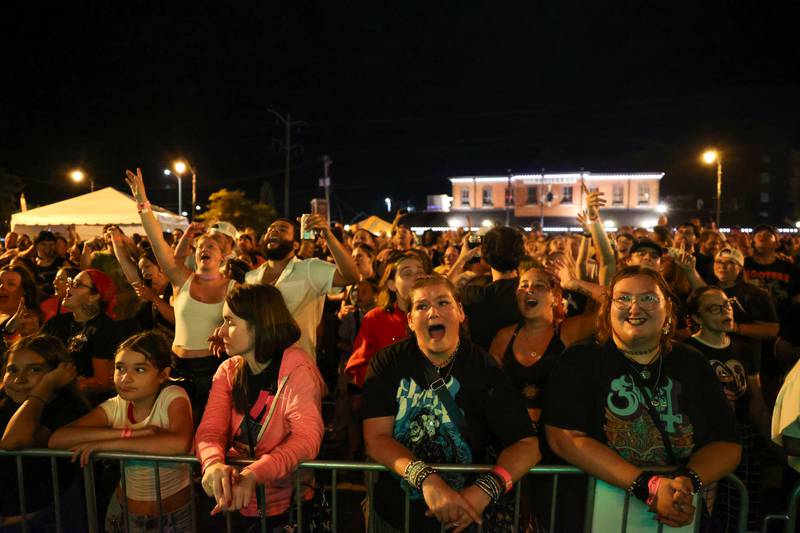 The crowd sings along as The All American Throwbacks perform on the Merchant Street Stage during Merchant Street MusicFest on Friday, July 25, 2025.
