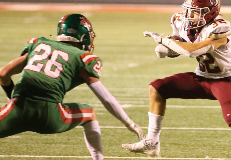 Morris's Nazim Baftin runs the ball as L-P's Griffin May looks to make the talkle on Friday, Sept. 20, 2024 at Howard Fellows Stadium.