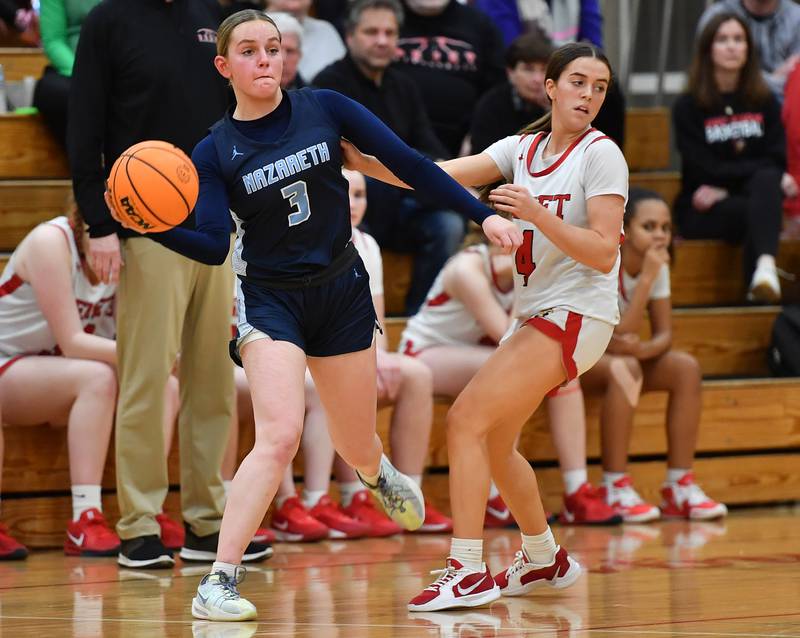 Nazareth’s Lyla Shelton (3) passes from in front of Benet’s Ava Mersinger during a game on January 29, 2025 at Benet Academy in Lisle.