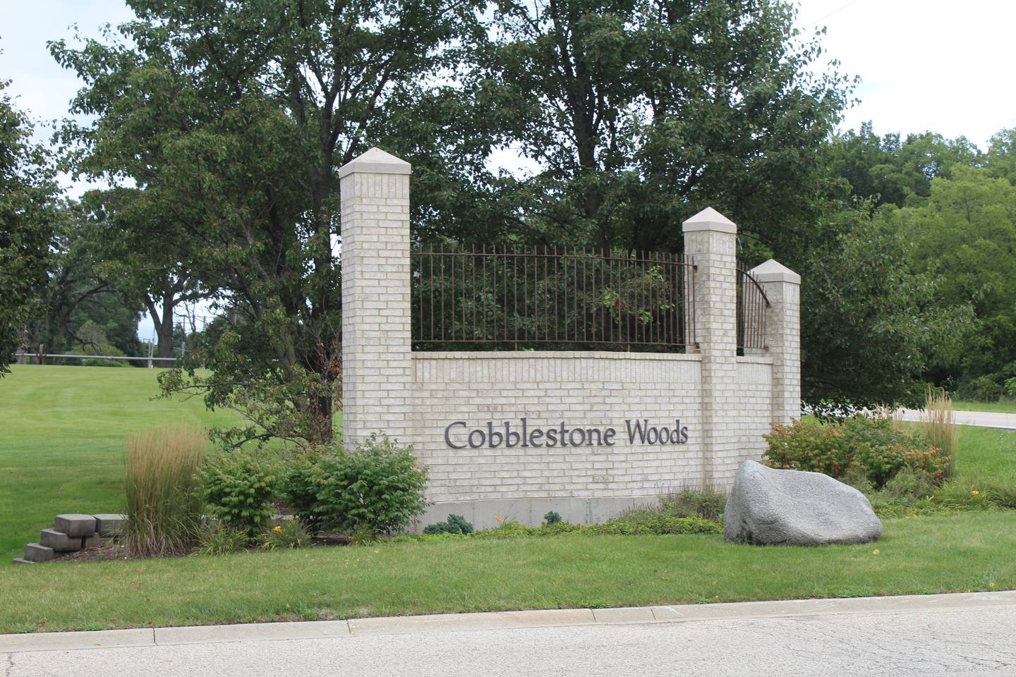 The entrance of the Cobblestone Woods townhome community in Prairie Grove.