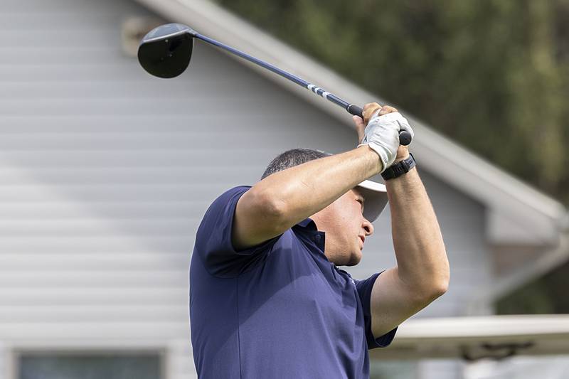 Jason Welker watches his first tee shot fly Sunday, July 21, 2024 during the final round of the 102nd Lincoln Highway golf tournament. The tournament was held at Emerald Hill in Sterling.