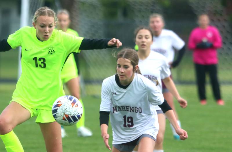 Marengo’s Regan Heimsoth, right, battles Richmond-Burton’s Sydney Frericks in IHSA Class 1A Regional Title Game action soccer at Marengo High School in Marengo on Wednesday, May 21, 2025.
