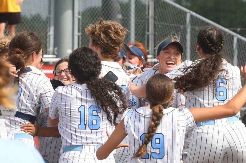 Members of the Oak Park River Forest softball team celebrate on the mound after winning the Class 4A thrid place game over Lockport on Saturday, June 14, 2025 at the Louisvile Slugger Complex in Peoria.