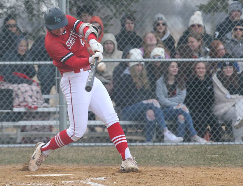 Streator's Noah Camp Landon Muntz smacks the ball to right field against Woodland/Flanagan-Cornell on Wednesday, March 15, 2023 at Woodland High School.