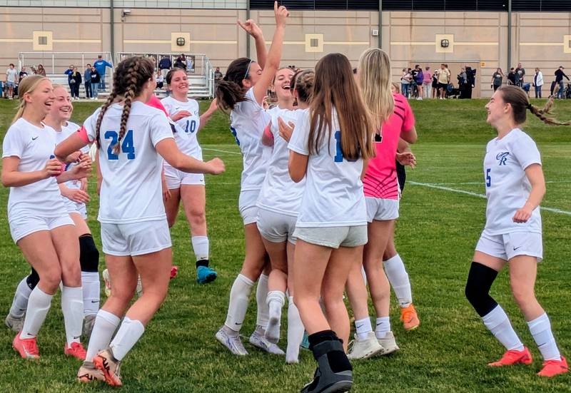 The Burlington Central girls soccer team celebrates its 3-1 victory over Sycamore in the Class 2A Sycamore Regional championship game on Saturday, May 24, 2025.