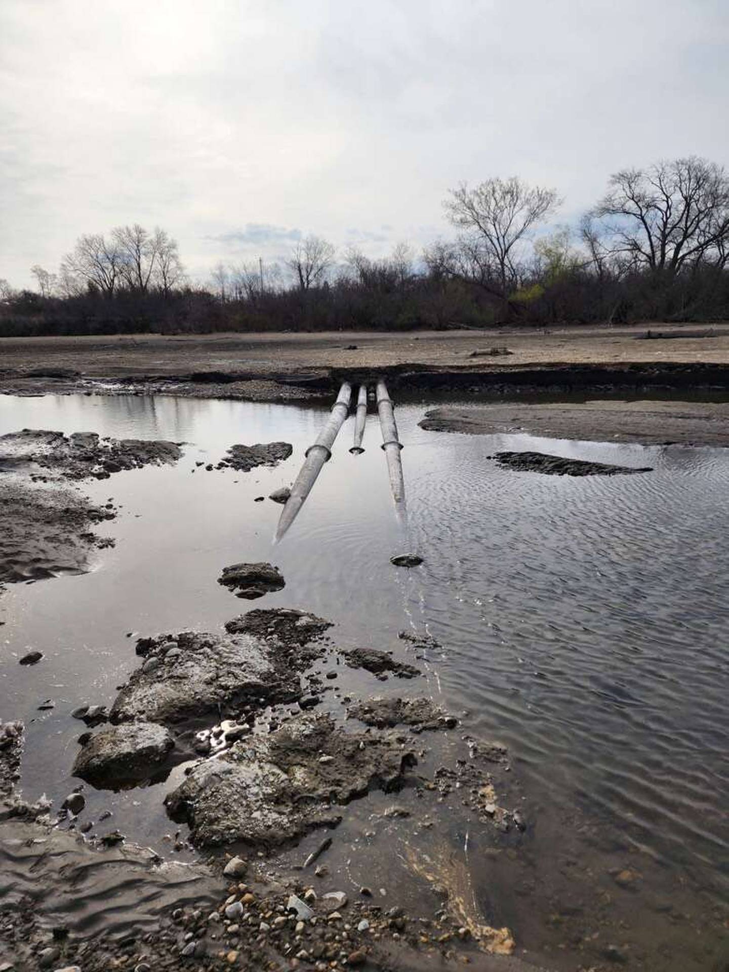 Carpentersville officials first noticed the exposed water and sewer lines in April. The lines, which now are covered in gravel, are just north of where the dam once was.