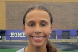 Downers Grove North freshman runner Macy Ermitage, after missing most of XC season, back in a big way on track