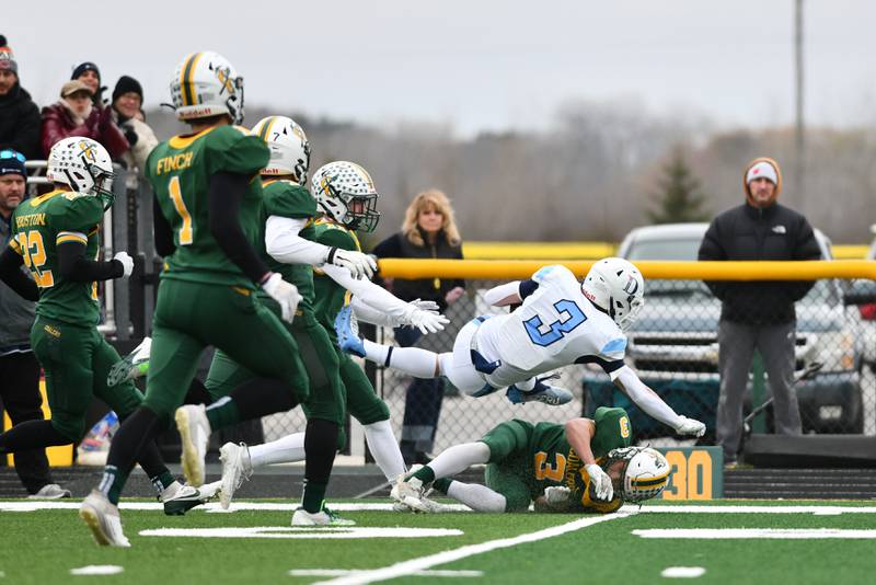 Coal City's Brody Widlowski falls underneath DePaul quarterback Nick Martinez causing him to fall Saturday, Nov. 23, 2024, during the Coalers' 21-14 loss to the Rams in the IHSA Class 4A Playoffs semifinal game.