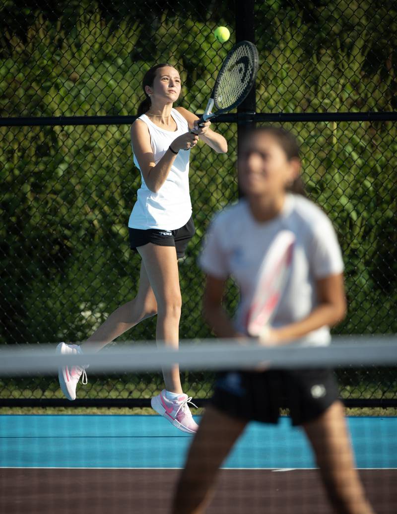 Kankakee's Ava Nelson makes a return hit in a doubles match against Bradley-Bourbonnais on Wednesday, September 10, 2025.