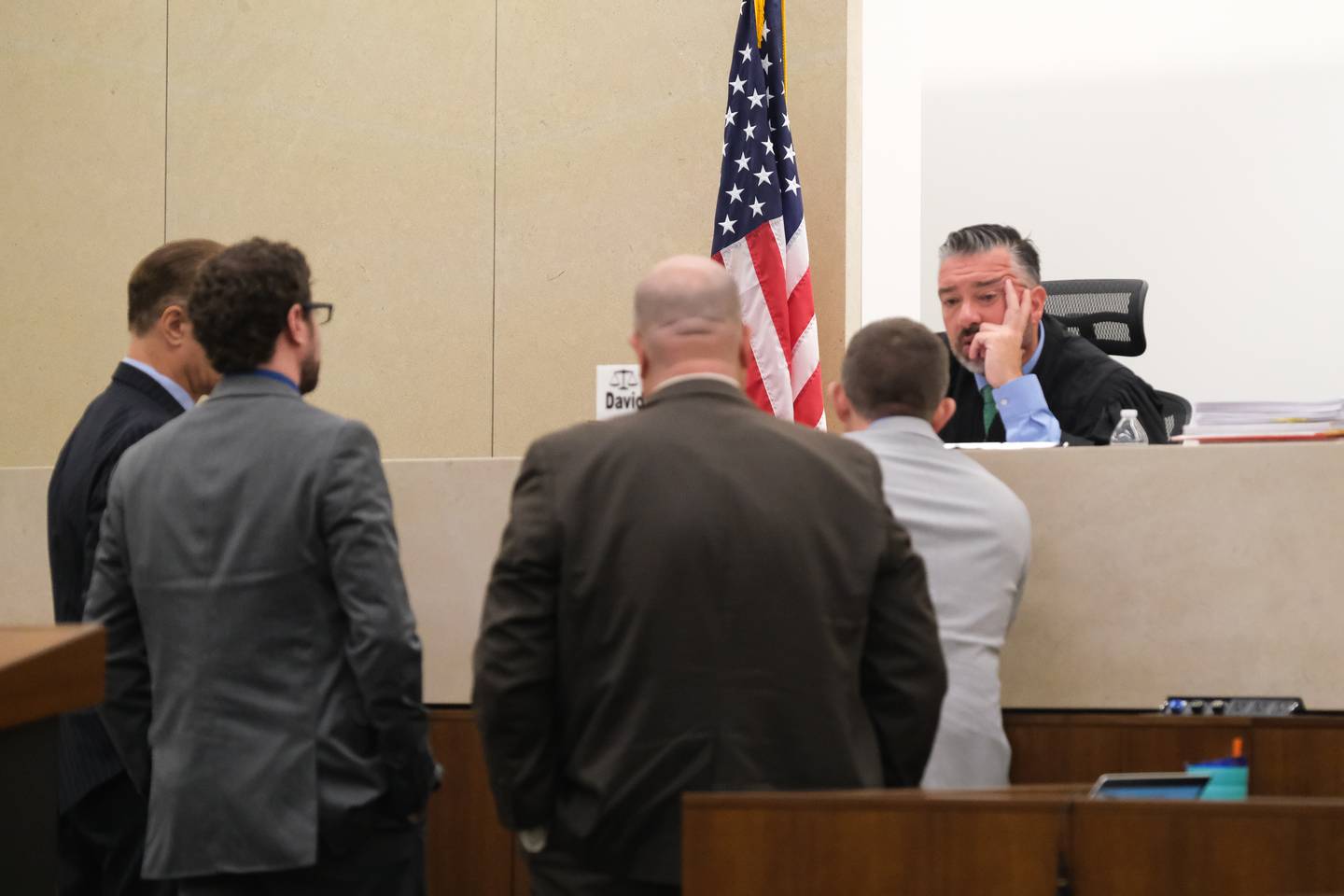 Judge David Carlson, right, talks to the defense and prosecution team during the Jeremy Boshears trial. Boshears is charged with the murder of Kaitlyn “Katie” Kearns, 24, on Nov. 13, 2017. Monday, April 25, 2022, in Joliet.
