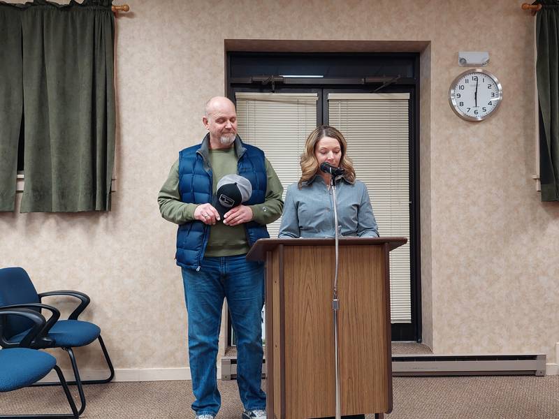 Retired Street and Sanitation Department Supervisor Quint Quiram (left) watches as City Manager Theresa Wittenauer speaks about his service to the city Monday, Feb. 5, 2024, during a Princeton City Council meeting at City Hall.