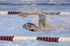 Morris boys swimming team motors past Joliet Central in opener