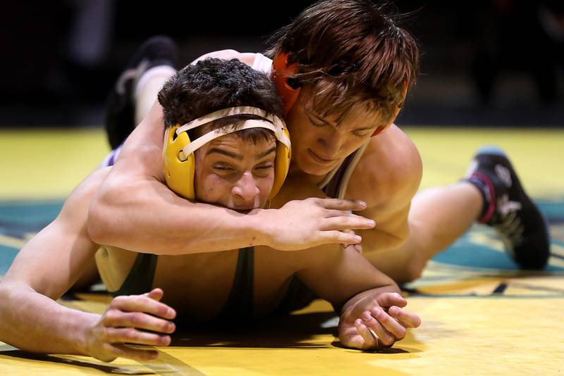 Hampshire’s Aric Abbott (left) controls Crystal Lake South’s Josiah Bradburn during the 150-pound match of a Fox Valley Conference wrestling meet on Thursday, Jan. 15, 2026, at Crystal Lake South High School.