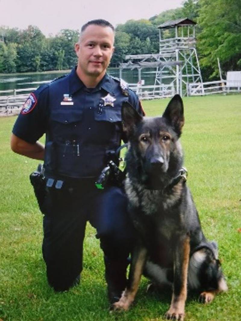 K-9 Arko with his handler, Kane County Sheriff's Lt. Michael Wilgosiewicz. Arko died this week after retiring from service March 1.