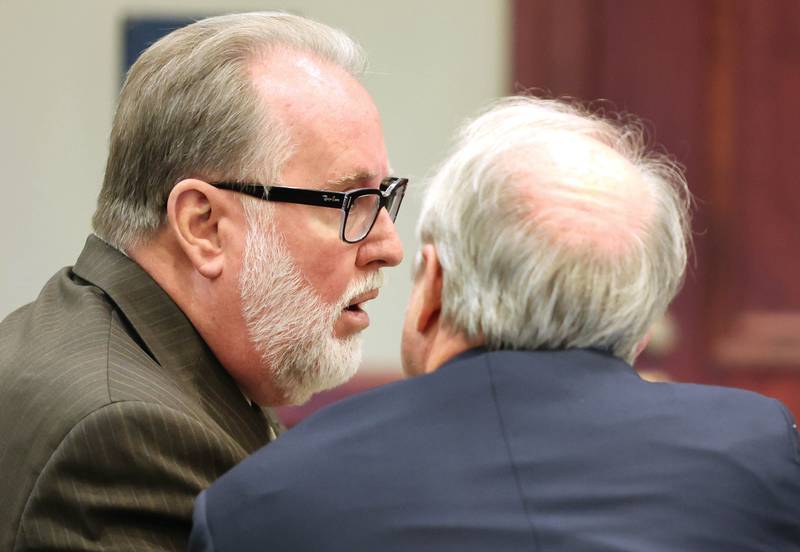 Former DeKalb School District 428 Superintendent Douglas Moeller talks to his attorney Clay Campbell during his trial Wednesday, Oct. 5, 2022, at the DeKalb County Courthouse in Sycamore. Moeller was charged in April 2018 with non-consensual dissemination of private sexual images, a class 4 felony.