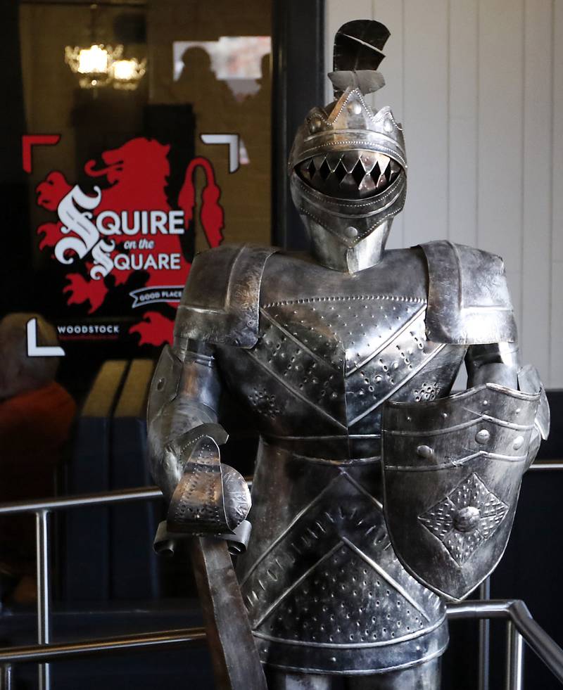 A knight guards the entrance on Tuesday, Nov. 12, 2024, to the Squire on the Square in Woodstock. 

The restaurant, which has similar decor as other Village Squire restaurants, is a joint venture between the Linardos family and Bob Karas of Karas Restaurant Group.
Squire on the Square is located in the basement of the Old Courthouse in Woodstock, and its menu will features items similar to the Linardos family’s restaurants and the Village Squire.  

The eatery replaces the Public House that closed at the end of March.