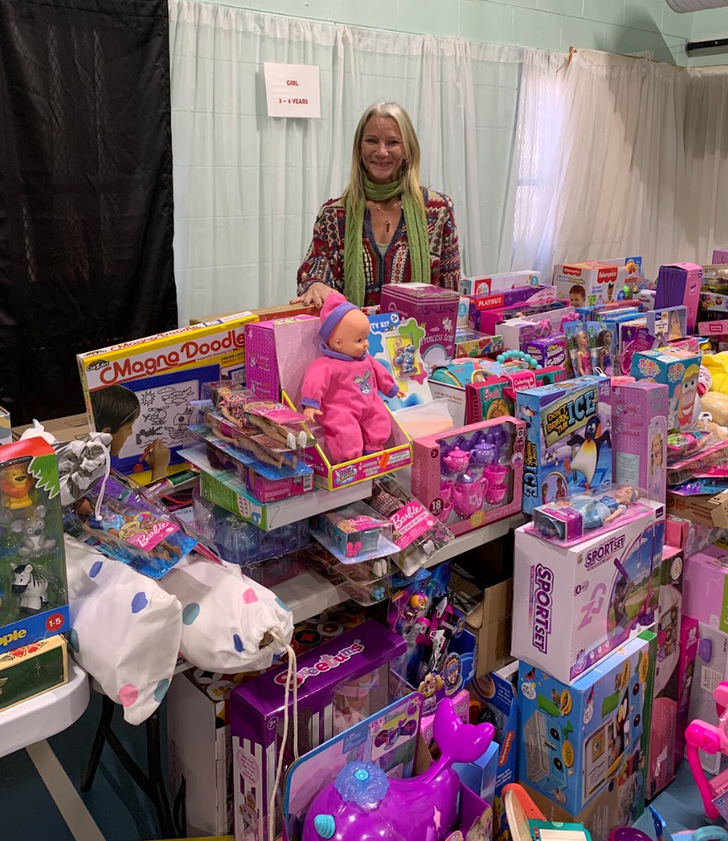 About 100 volunteers helped the Salvation Army of McHenry County distribute thousands of donated gifts to families on Dec. 17 and 18, 2024, in Crystal Lake.