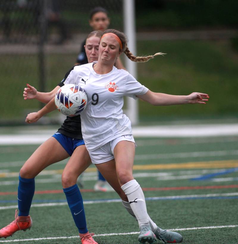 Wheaton Warrenville South's Kelsey Clousing handles the ball during the Class 3A Glenbard West Sectional final against St. Charles North on Friday, May 30, 2025 in Glen Ellyn.