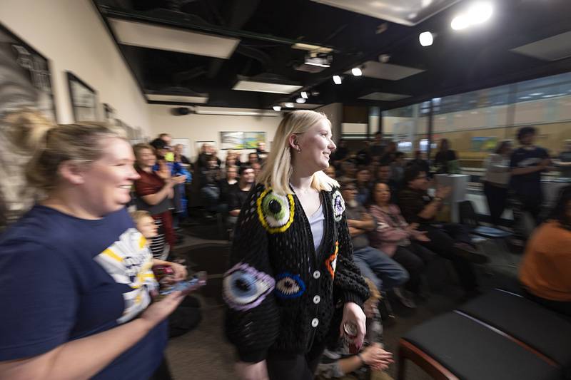 Allie Cook heads up to accept an award Thursday, April 9, 2026, during the opening of SVCC’s annual art exhibit. Cook received one of three President’s Awards and was also awarded Best of Show.