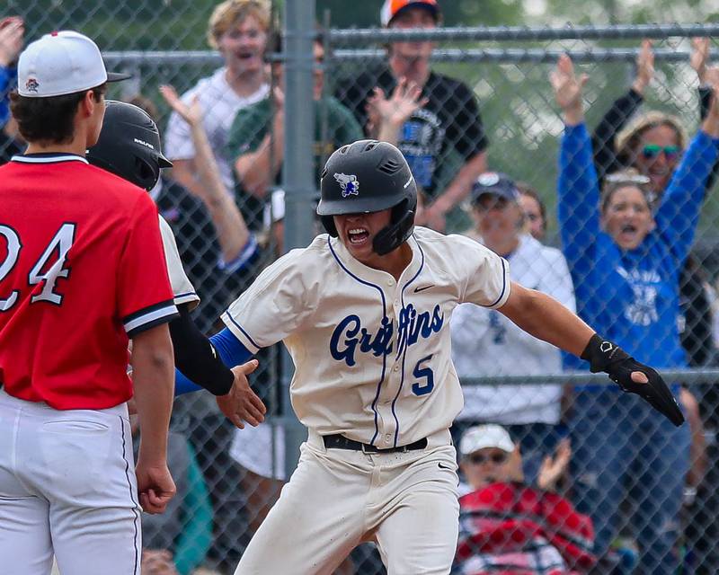 Lincoln-Way East's MJ Schley (5) celebrates after scoring a run during Class 4A Lincoln-Way West sectional semi-final baseball game between Lincoln-Way East at Lincoln-Way Central. Thursday, June 5, 2025 in New Lenox.