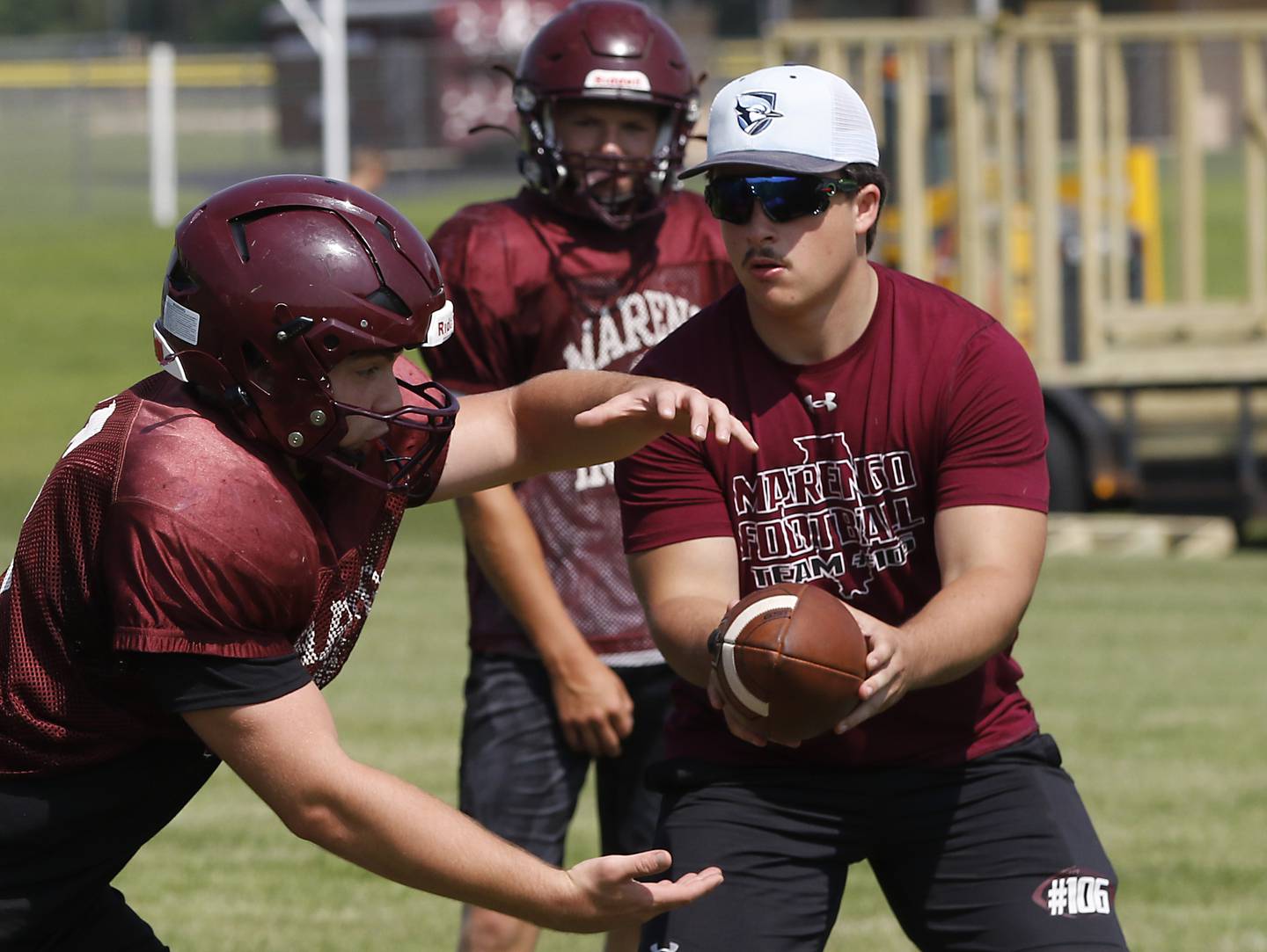 Marengo’s Connor Sacco receives a handoff  during football practice on Tuesday, July 22,  2025, at Marengo High School.