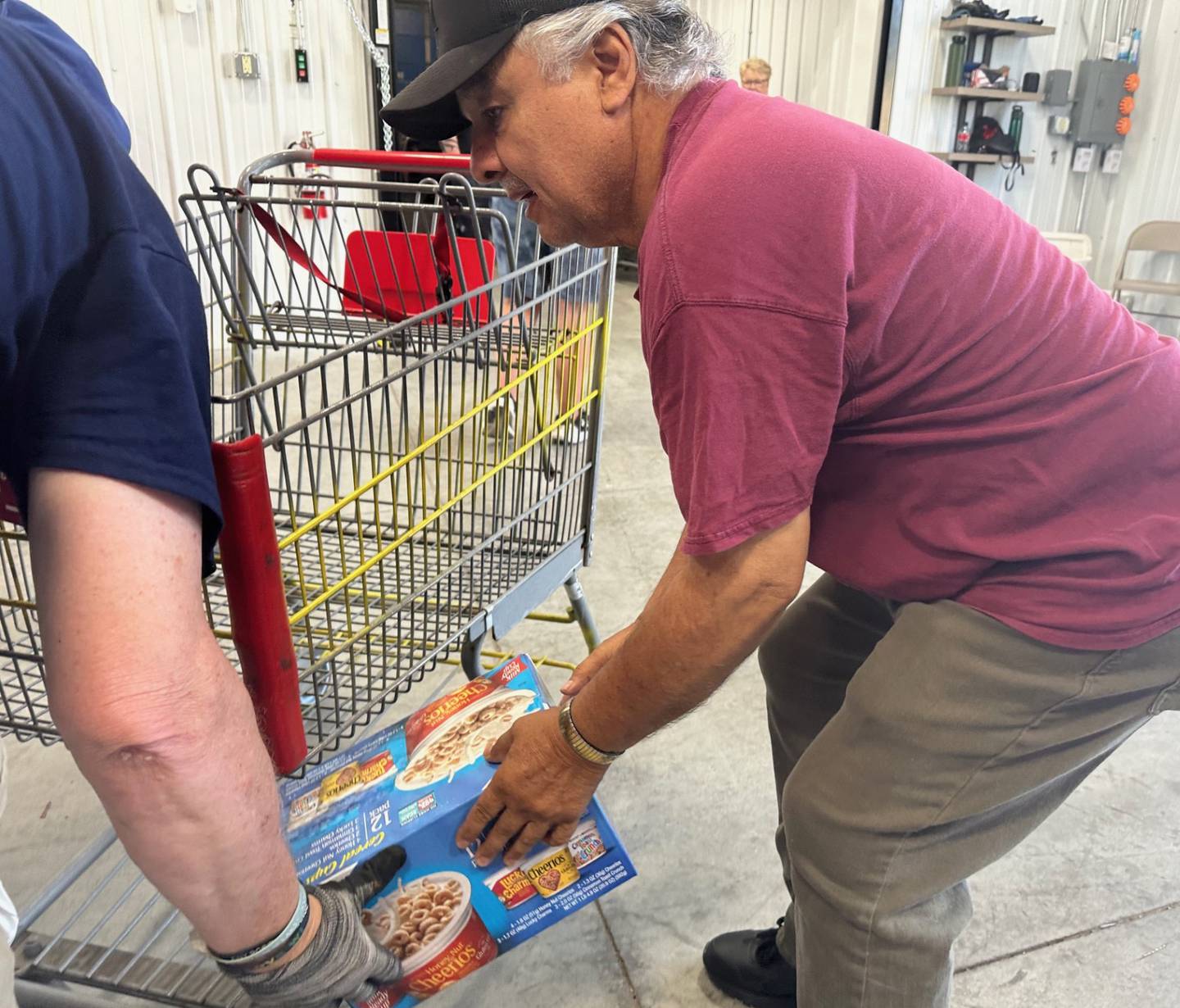 Jose Ontiverus volunteers at the Hall Township Food Pantry on Wednesday, June 12, 2024 in Spring Valley.