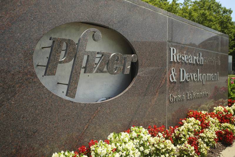 A Pfizer sign is seen out front of the Pfizer Research & Development Laboratories Wednesday, July 22, 2020, in Groton, CT. (AP Photo/Stew Milne)