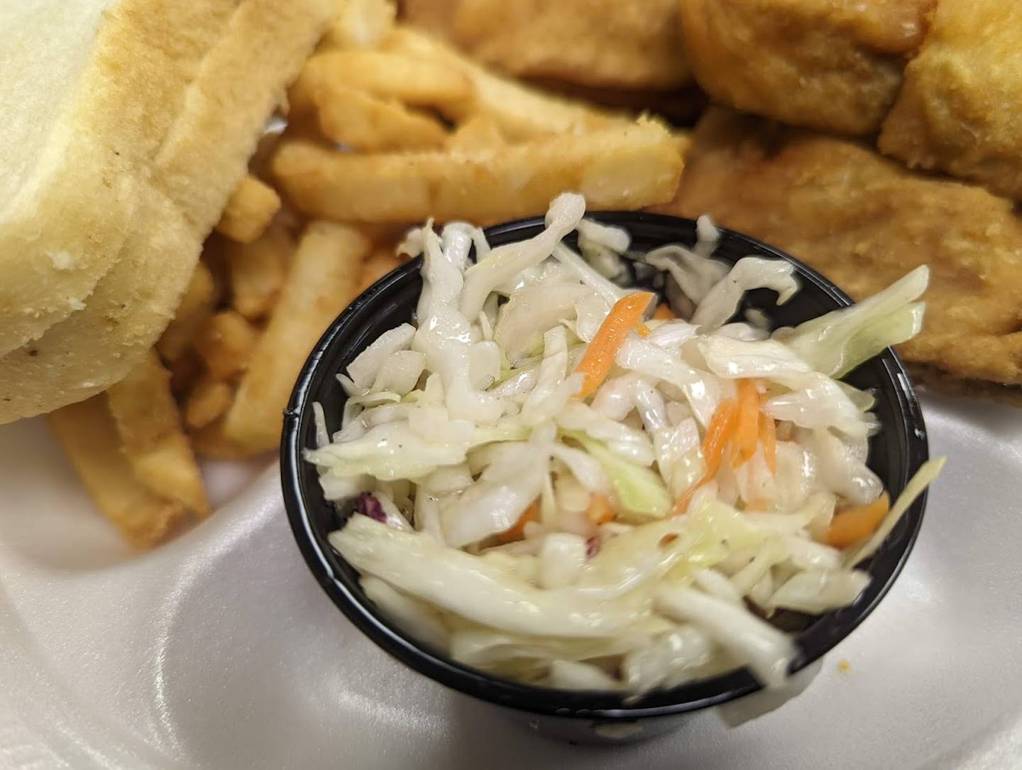 Pictured is the vinegar cole slaw  as served with a chicken dinner at the Knights of Columbus Holy Trinity Council No. 4400 on Joliet's East side. The dinner also came with battered fries and two slices of bread.
