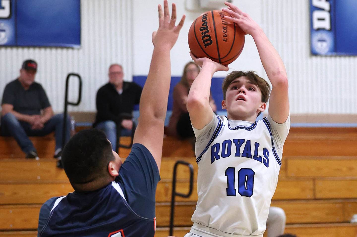 Hinckley-Big Rock’s Alex Casanas shoots over DePue’s Ramon Arevalo during their game Tuesday, Feb. 13, 2024, at Hinckley-Big Rock High School.