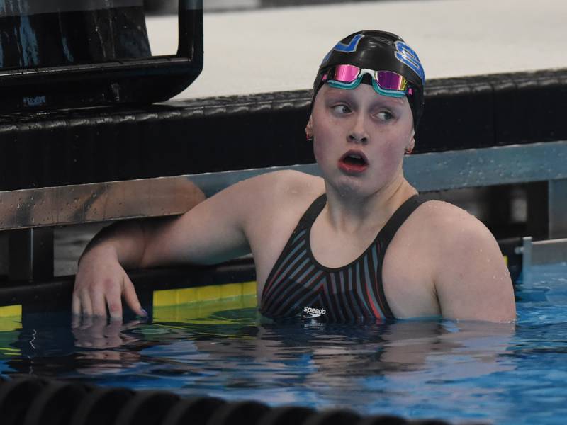 St. Charles North’s Isabelle Beu reacts to her second-place finish in the 200-yard individual medley during the IHSA girls state swimming finals at FMC Natatorium in Westmont on Saturday, Nov. 12, 2022.