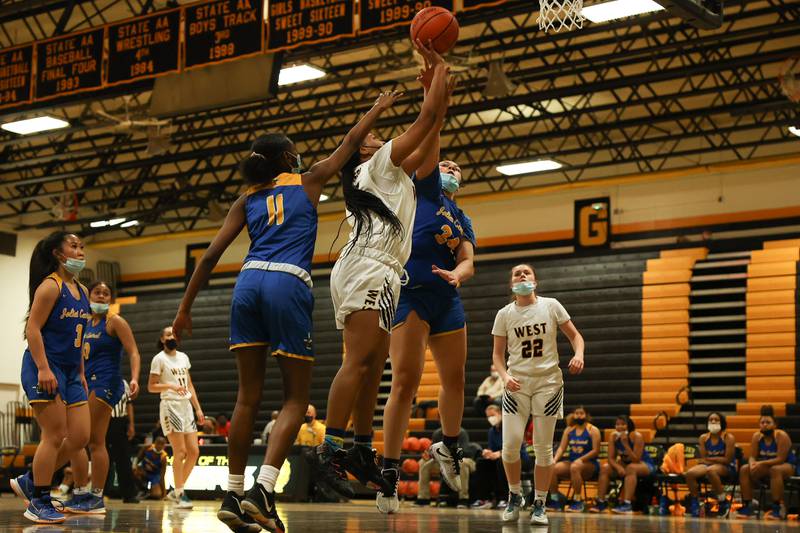 Joliet West’s Mariah Shelton takes a shot from the paint against Joliet Central. Tuesday, Feb. 8, 2022, in Joliet.