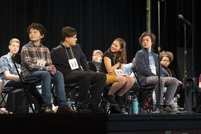 The final four contestants Parker Zimmerly (left), Alexander Ottens, Cora Schmidt and Jake Bailey appears on stage Thursday, March 9, 2023 during the Lee-Ogle-Whiteside Regional Spelling Bee.