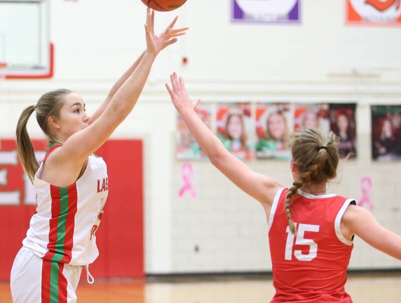 L-P's Emma Garretson shoots a jump shot over Ottawa's Hailey Larsen on Friday, Jan. 27, 2023 at L-P High School.