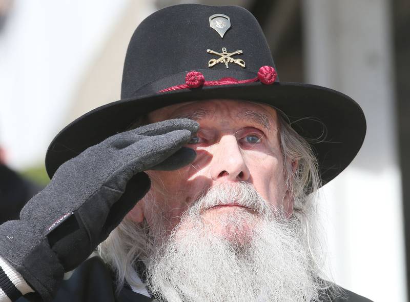 Gary Bruno salutes the flyover during the annual Pearl Harbor parade and memorial service on Saturday in Peru. This year marks the 83rd anniversary of the Dec. 7, 1941, attack on Pearl Harbor.