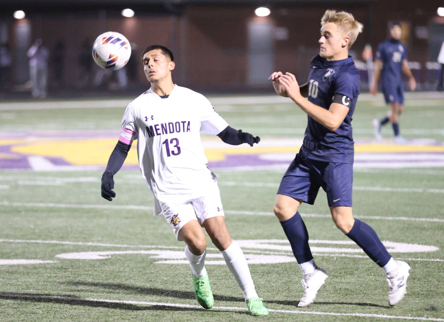 Mendota's Sebastian Carlos eyes the ball as Quincy Notre Dame's Nolan Heck defends during the Class 1A Supersectional game on Monday, Nov. 3, 2025 at Mendota High School.