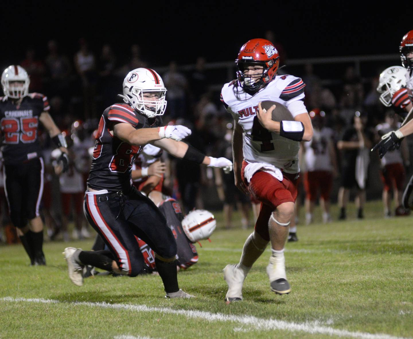 Fulton's Dom Kramer (4) runs for a gain against Forreston during the 2023 season.