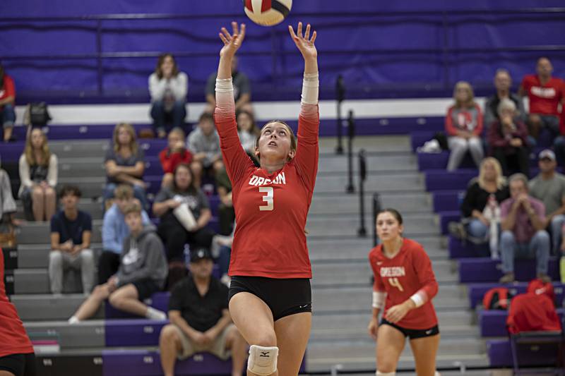 Oregon’s Lexi Ebert sets the ball against Dixon Tuesday, Sept. 26, 2023 at Dixon High School.Tuesday, Sept. 26, 2023.