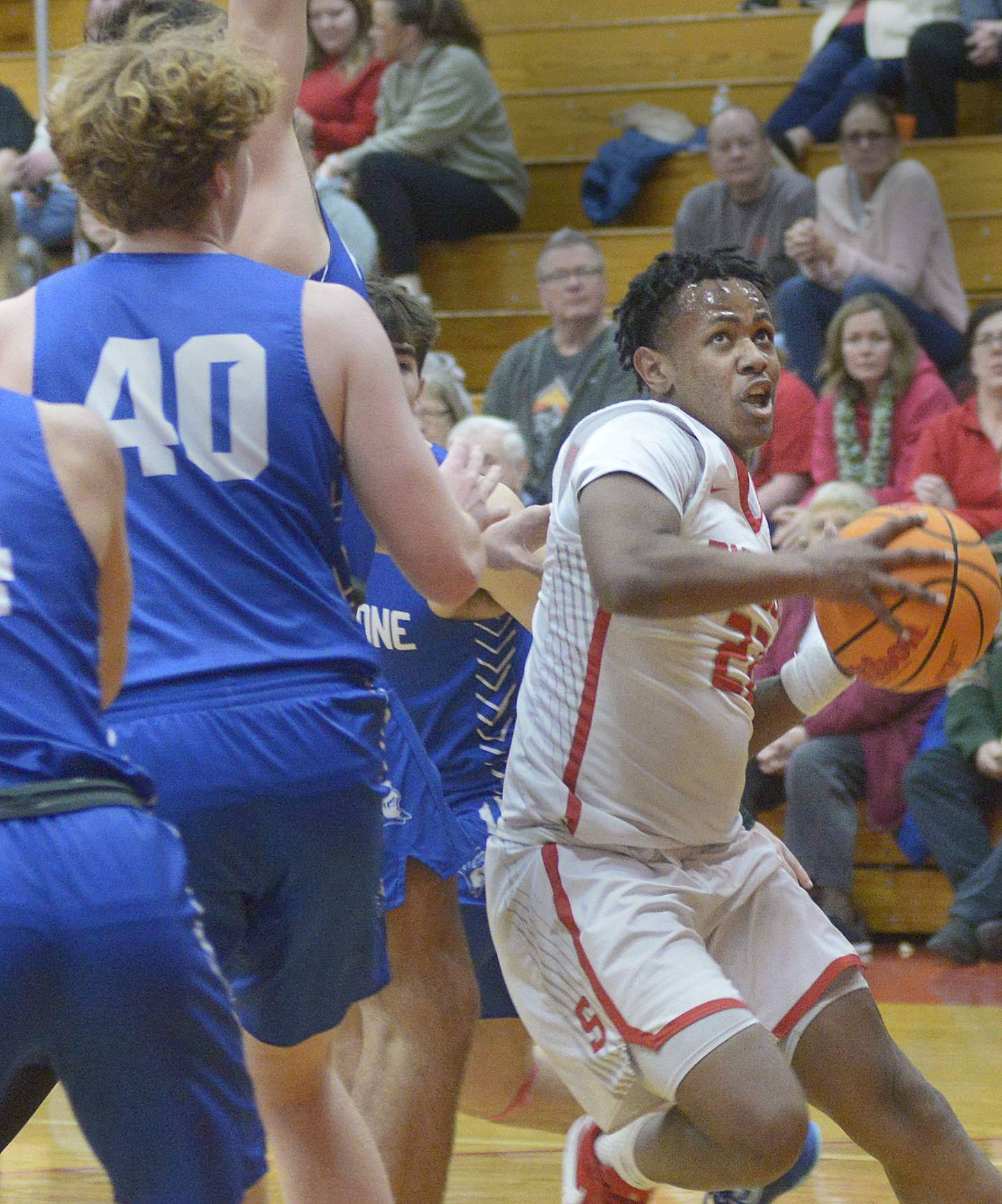 Streator’s Tristan Finley drives to the basket past Peotone’s Logan Mather in the 1st Period Tuesday at Streator.