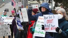 Photos: Protesters gather in DeKalb to voice opposition to recent actions in Venezuela