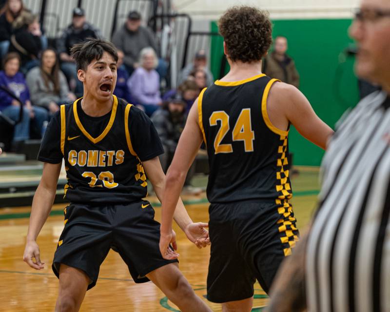 Tanner Gullquist (20) of Reed-Custer and teammate Colton Waldvogel (24) celebrate after win against DePue in the Shipyard Showdown on Tuesday, December 23, 2025 at Seneca High School in Seneca.