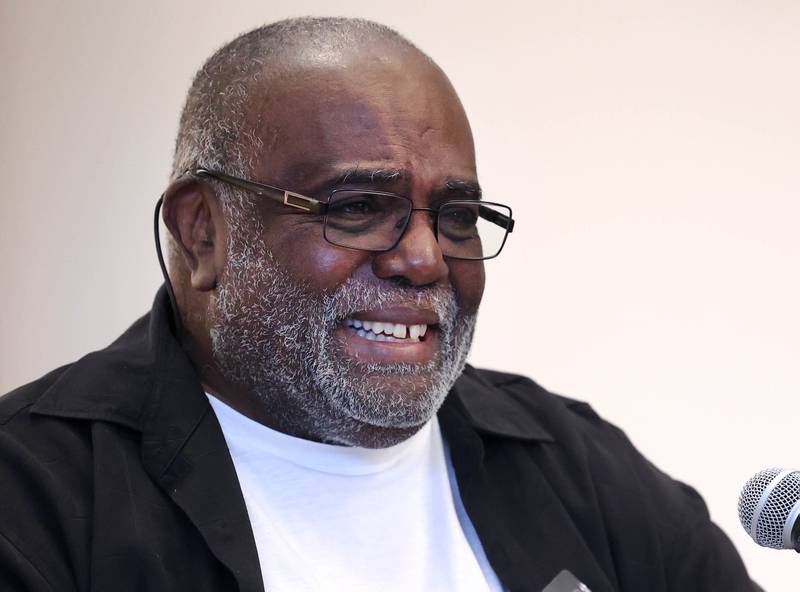 Leroy Mitchell smiles as he speaks Friday, Aug. 8, 2025, during the grand opening celebration for the school that bears his name, Dr. Leroy A. Mitchell Elementary School in DeKalb.