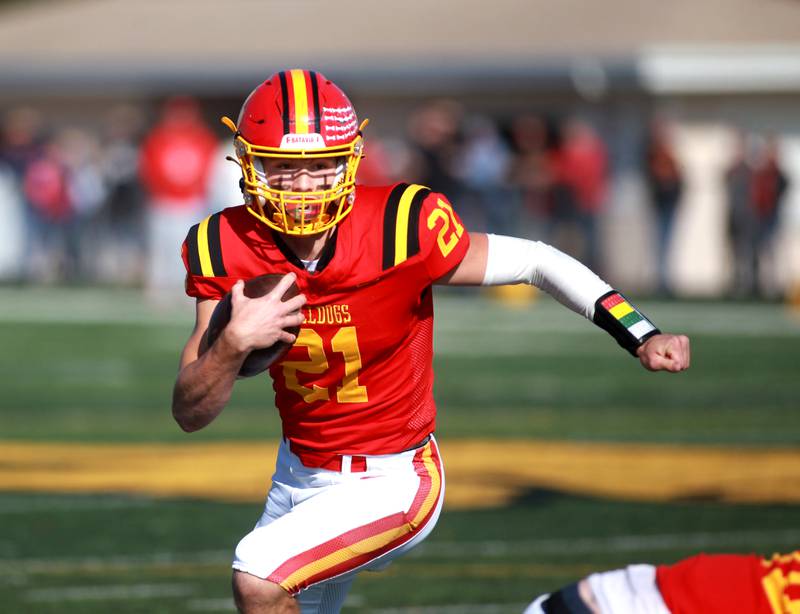 Batavia quarterback Ryan Boe keeps the ball during the Class 7A second round playoff game against Lincoln-Way Central in Batavia on Saturday, Nov. 4, 2023.