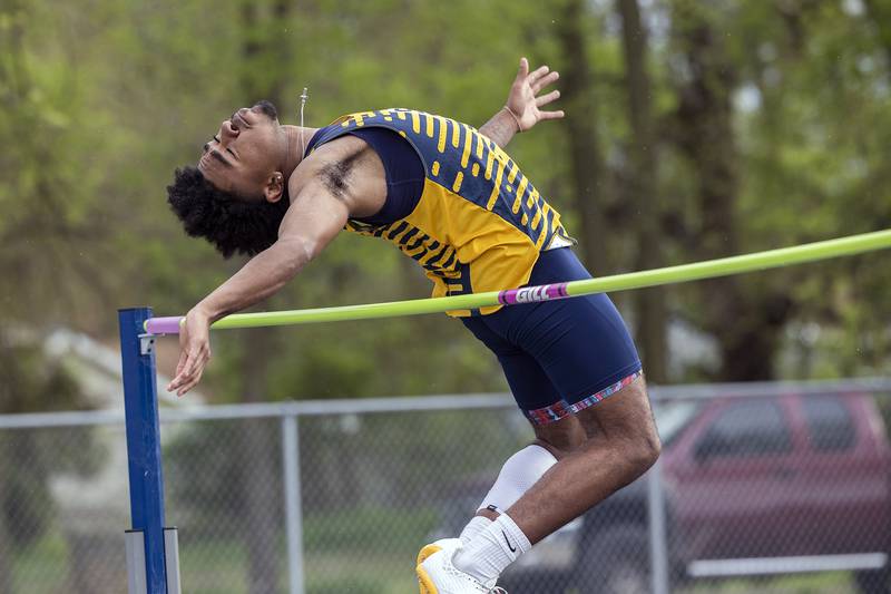 Sterling’s Kaedon Phillips clears the bar in the high jump Friday, May 2, 2025, at the Sterling Night Relays.